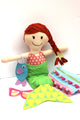 Mermaid doll with removable fin, towel, fish bag, sunglasses featured in the Make a Friend Megan Mermaid Doll and Accessories Sewing Pattern by Jennifer Jangles