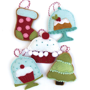 Bakeshop Felt Holiday Ornaments Sewing Pattern by Jennifer Jangles featuring stocking and Christmas tree cookies and holiday cupcakes