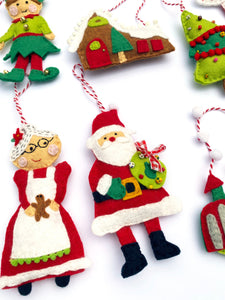 Mrs. Claus and Santa felt ornament included in the 12 Felt Holiday Ornaments Sewing Pattern Kit by Jennifer Jangles