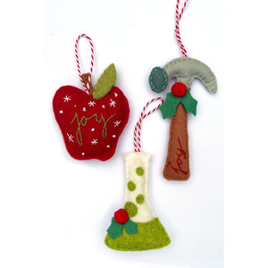 Apple, hammer, beaker ornaments featured in the Scientist, Teacher, and Builder Felt Holiday Ornaments Sewing Pattern by Jennifer Jangles