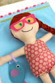 Close up of mermaid doll wearing sunglasses featured in the Make a Friend Megan Mermaid Doll and Accessories Sewing Pattern by Jennifer Jangles