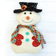 Snowman with hat, mittens, scarf featured in the Mr. Snowjangles Softie Sewing Pattern by Jennifer Jangles