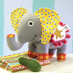 Colorful stuffed elephant toy featured in the Pickles the Elephant Softie Sewing Pattern by Jennifer Jangles