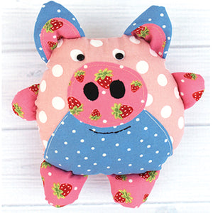 Stuffed pig toy featured in the Pinky the Pig Softie Sewing Pattern by Jennifer Jangles