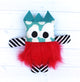 Turquoise + white polka dot, black + white striped, red fuzzy monster featured in the Mix n Match Monsters Sewing Pattern by Jennifer Jangles