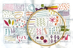 30 Day Embroidery Sampler on an embroidery hoop - Embroidery Pattern by Jennifer Jangles