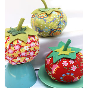 Floral Tomato pincushions featured in the Jumbo Tomato Pin Cushion Sewing Pattern by Jennifer Jangles