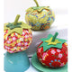 Floral Tomato pincushions featured in the Jumbo Tomato Pin Cushion Sewing Pattern by Jennifer Jangles