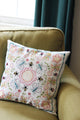Finished accent pillow embellished using the Embroidery Pattern - Flowers and Insects by Jennifer Jangles