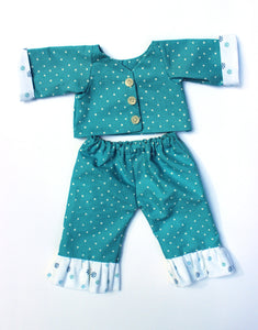 Blue and white polka dotted shirt and pants set featured in the Make a Friend Doll's Wardrobe Sewing Pattern by Jennifer Jangles